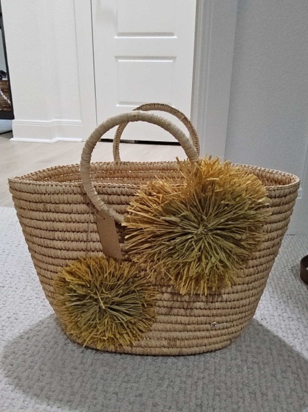 Handwoven Straw Tote with Yellow Pom-Pom Accents